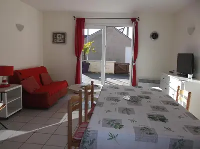 Télévision ou salle de divertissement dans l'établissement résidence Etoile de mer