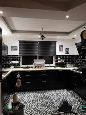 Cuisine ou kitchenette dans l'établissement La maison du bonheur