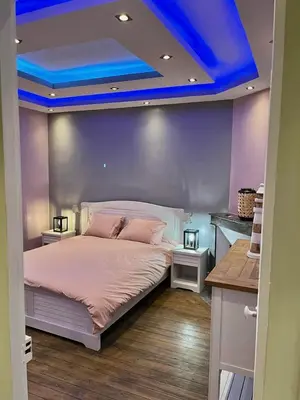 Un ou plusieurs lits dans un hébergement de l'établissement Jolie maison proche des commerces et de la plage
