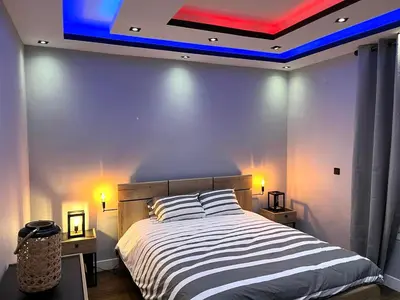 Un ou plusieurs lits dans un hébergement de l'établissement Jolie maison proche des commerces et de la plage