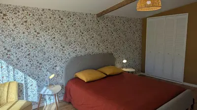 Un ou plusieurs lits dans un hébergement de l'établissement La Glycine, maison normande proche de la mer et des lieux touristiques