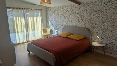 Un ou plusieurs lits dans un hébergement de l'établissement La Glycine, maison normande proche de la mer et des lieux touristiques
