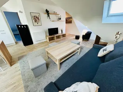Coin salon dans l'établissement Appartement T.3 - Bord de mer