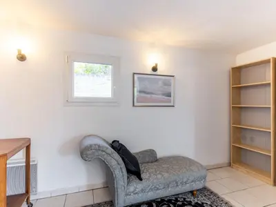 Coin salon dans l'établissement Holiday Home Le Mimosa Normand by Interhome