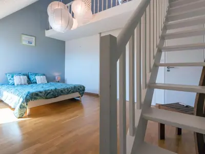 Un ou plusieurs lits dans un hébergement de l'établissement Holiday Home l'Agon by Interhome