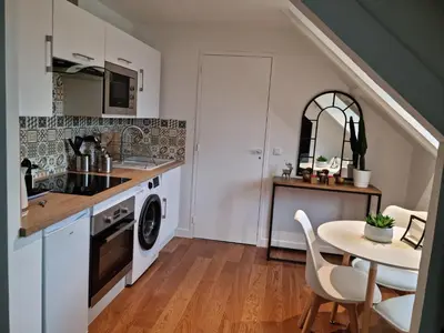 Cuisine ou kitchenette dans l'établissement Charmant Studio Centre ville