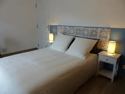 Un ou plusieurs lits dans un hébergement de l'établissement Cottage des Mézières