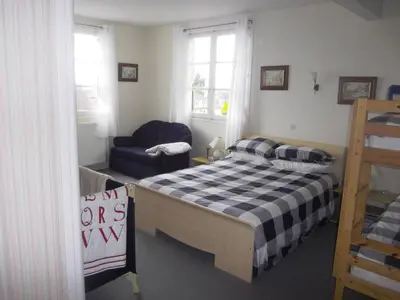 Un ou plusieurs lits dans un hébergement de l'établissement Lenard Charles Bed & Breakfast