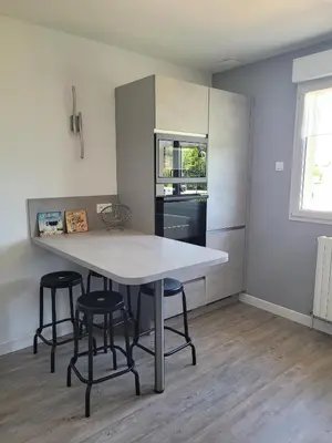 Cuisine ou kitchenette dans l'établissement La Mosloise