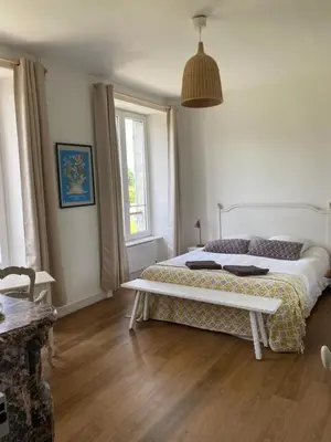 Un ou plusieurs lits dans un hébergement de l'établissement La Maison du Hommeel