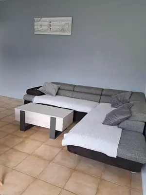 Coin salon dans l'établissement Gite des falaises de Longues 8personnes
