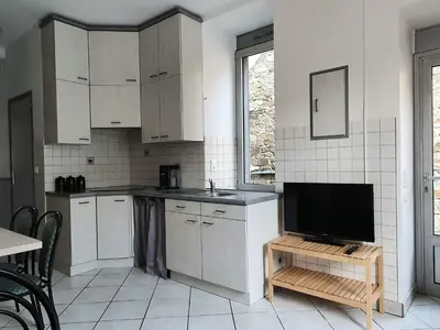 Cuisine ou kitchenette dans l'établissement Appartement au n°1 centre d'Avranches