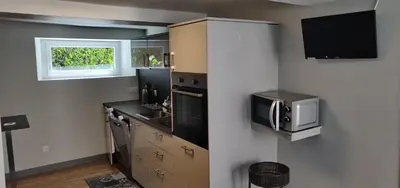 Cuisine ou kitchenette dans l'établissement Aux belles pierres
