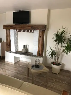 Télévision ou salle de divertissement dans l'établissement Gîte T'ché Dédée