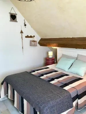 Un ou plusieurs lits dans un hébergement de l'établissement Chambres d'Hôtes Lefoulon