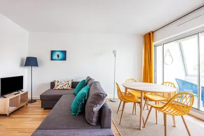 Télévision ou salle de divertissement dans l'établissement La Tortue Joyeuse - Appartement avec Loggia