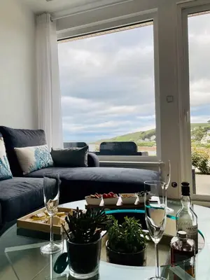 Coin salon dans l'établissement Au Petit Brick - Cosy beachfront house