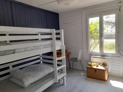 Un ou plusieurs lits dans un hébergement de l'établissement Maison les pieds dans la mer