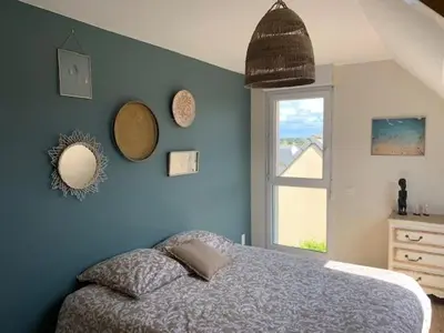 Un ou plusieurs lits dans un hébergement de l'établissement La villa Noukey à 150m de la plage et des cabines