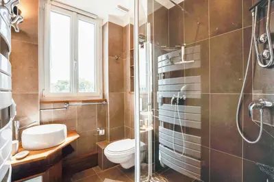 Salle de bains dans l'établissement Villa Les Hirondelles - Appartement avec Jardin Front de mer
