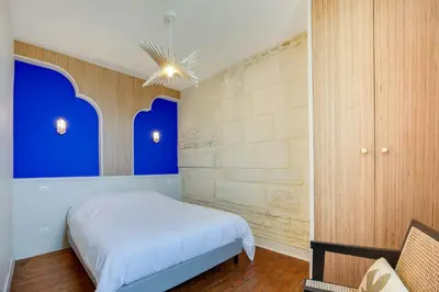 Un ou plusieurs lits dans un hébergement de l'établissement Villa Les Hirondelles - Appartement avec Jardin Front de mer