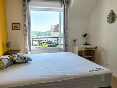 Un ou plusieurs lits dans un hébergement de l'établissement Duplex 2 pièces Port Cabourg - 2 à 4 personnes - Terrasse - Vue Port - Proche Plage