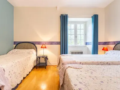 Un ou plusieurs lits dans un hébergement de l'établissement Holiday Home La Vallée by Interhome