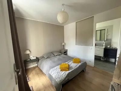 Un ou plusieurs lits dans un hébergement de l'établissement Le 33 Maison de charme coeur Cotentin