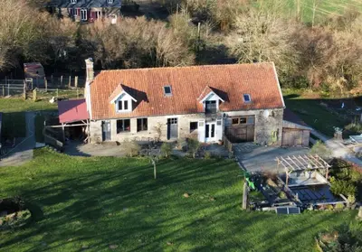 Jardin de l'établissement Ferme de Noyes Cottage