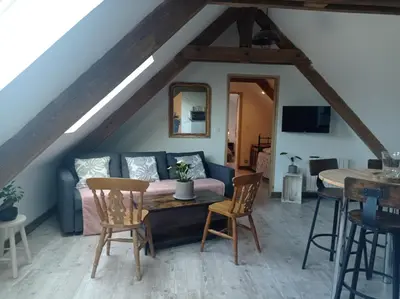 Télévision ou salle de divertissement dans l'établissement Maris Domus près des plages du débarquement