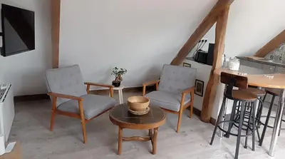Télévision ou salle de divertissement dans l'établissement Maris Domus près des plages du débarquement