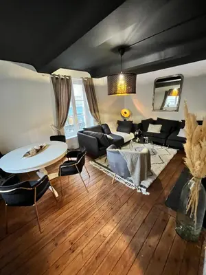Coin salon dans l'établissement SAMANDINE HOME