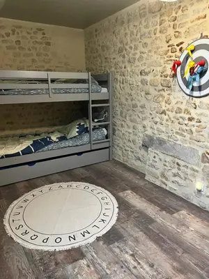 Un ou plusieurs lits dans un hébergement de l'établissement SAMANDINE HOME
