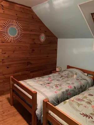 Un ou plusieurs lits dans un hébergement de l'établissement GITE EQUESTRE DE LA LANDE