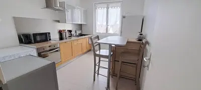 Cuisine ou kitchenette dans l'établissement Appartement 3 étoiles de 63m2