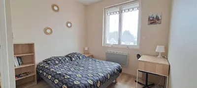 Un ou plusieurs lits dans un hébergement de l'établissement Appartement 3 étoiles de 63m2