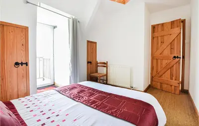 Un ou plusieurs lits dans un hébergement de l'établissement Lovely Home In Vire Normandie With Wifi