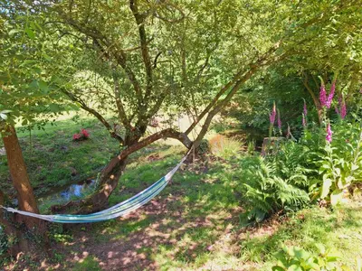 Jardin de l'établissement L'authentique Tonneau à Cidre d'Emma