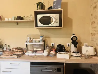 Cuisine ou kitchenette dans l'établissement Chambres Vaugoubert
