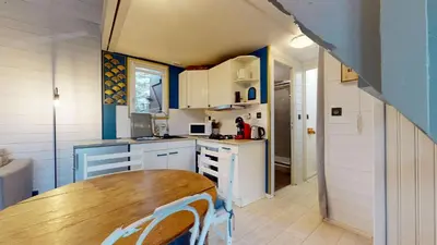 Cuisine ou kitchenette dans l'établissement Le chalet Normand