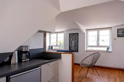 Cuisine ou kitchenette dans l'établissement Grand appartement spacieux sur les toits de Bayeux