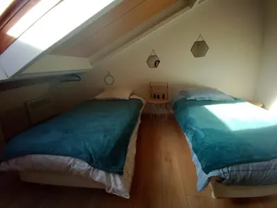 Un ou plusieurs lits dans un hébergement de l'établissement DUPLEX les pieds dans l' eau