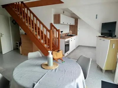 Cuisine ou kitchenette dans l'établissement DUPLEX les pieds dans l' eau