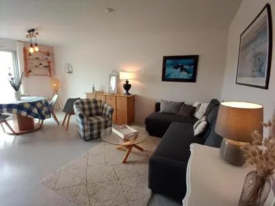 Coin salon dans l'établissement DUPLEX les pieds dans l' eau