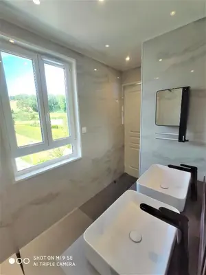 Télévision ou salle de divertissement dans l'établissement Maison des Pommiers - Bord de mer et campagne