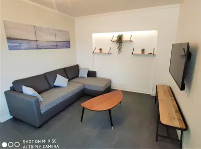 Télévision ou salle de divertissement dans l'établissement Maison des Pommiers - Bord de mer et campagne