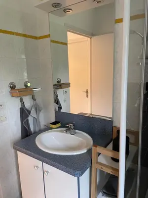 Salle de bains dans l'établissement Le Courtil