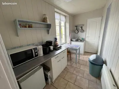 Cuisine ou kitchenette dans l'établissement Le Tricorne