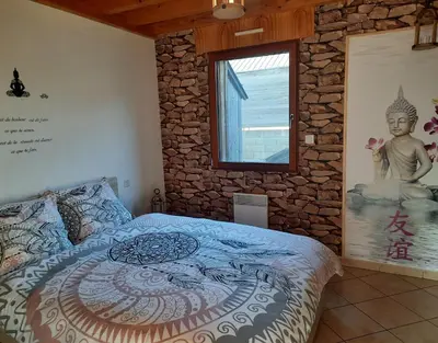 Un ou plusieurs lits dans un hébergement de l'établissement Cottage Le Canari 3 étoiles, à 5 minutes du Mont St-Michel