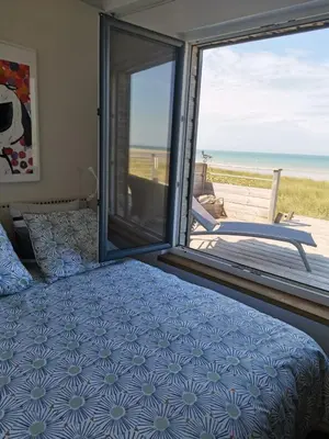 Un ou plusieurs lits dans un hébergement de l'établissement La maison sur la plage